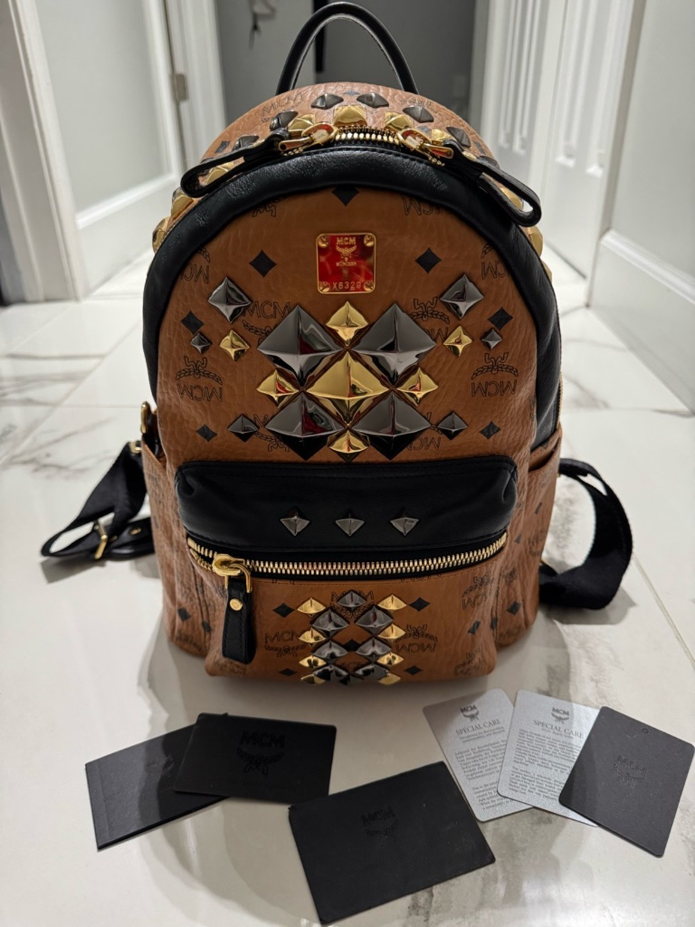 MCM Cognac Leather Studded Mini Backpack with Black Accents